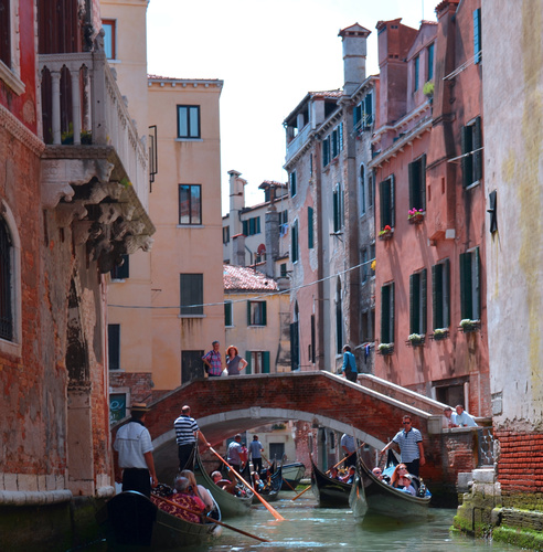 Gondolas in canal of Venice