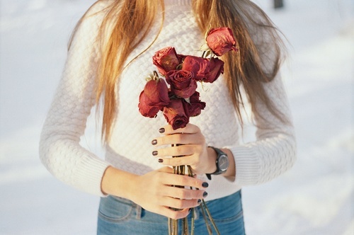 Dried flowers in hands