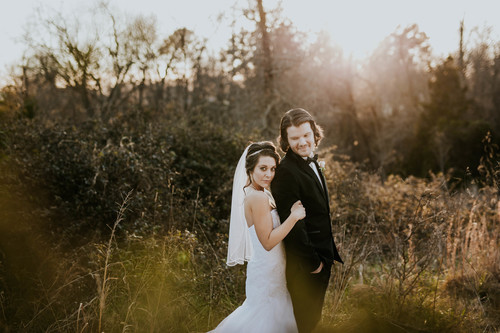 Newlyweds posing in nature