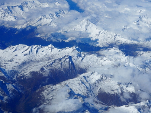 Cloudy Alps from above