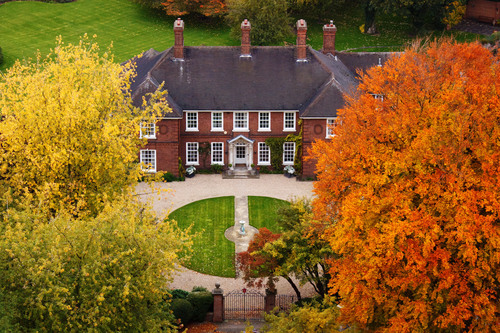 Mansion In Autumn Leaves