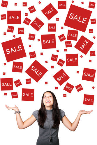 Young woman enjoying sales