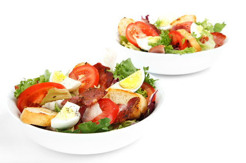 Salad in white bowls
