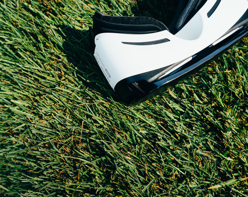 Virtual reality goggles on grass