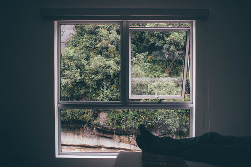 Feet by the window