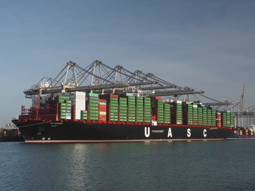 Freighter ship unloading cargo