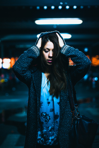 Woman with hooded jacket