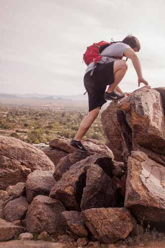 Man climbing rocks