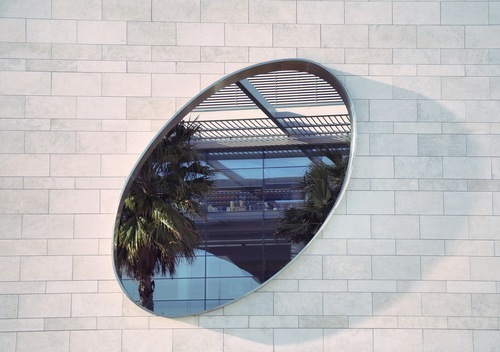 Oval window with hotel terrace