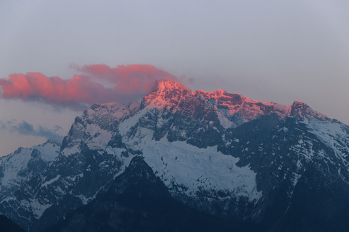 Cold mountain with sun beams at the top