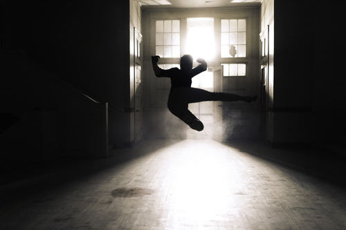 Dancer jumping in daylight