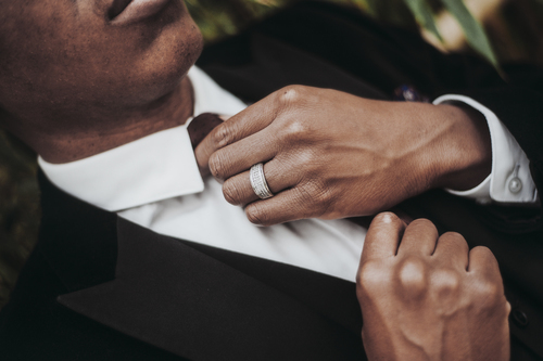 Man fixing his tie