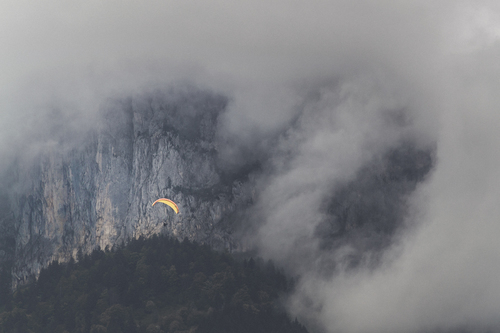 Parachute in front of fog