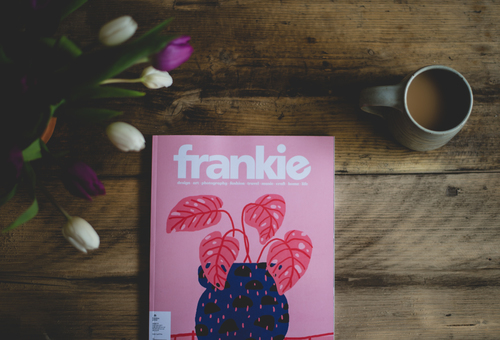 Pink book, tulips and coffee