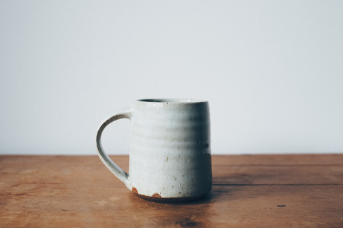 Single mug on desk