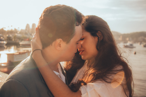 Romantic couple almost kissing