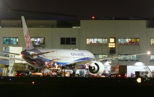 Boeing 777 parked at airport