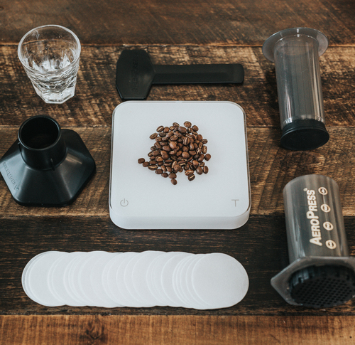 Coffee beans with grinder