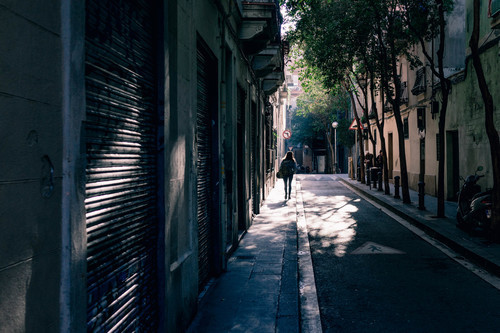 Shadow street in Barcelona, Spain
