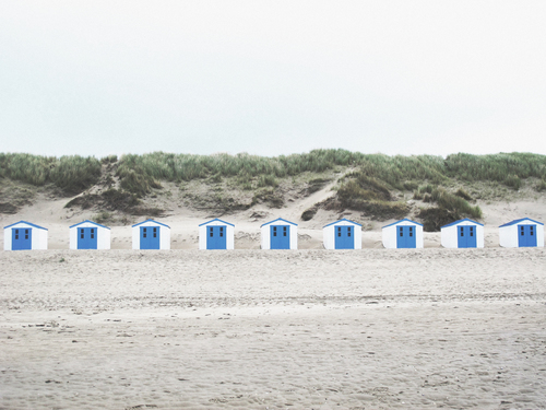 Blue and white beach huts