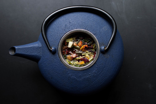 Kettle filled with herbs