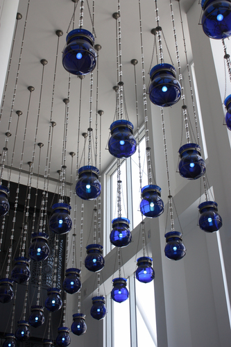 Blue lanterns hanging from ceiling