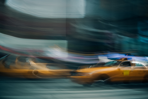 Blurry yellow taxi cab