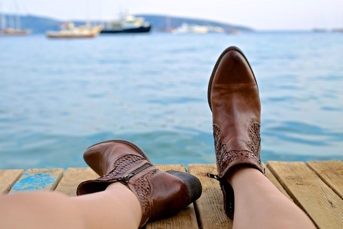 Boots by the water