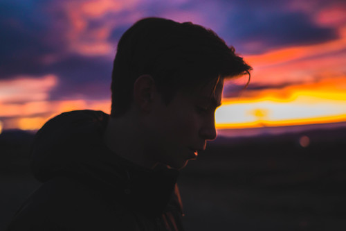 Boy in sunset