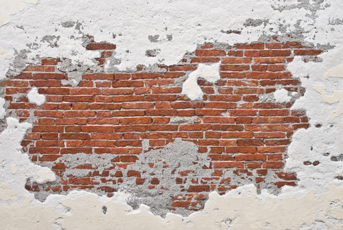 Bricks under wall