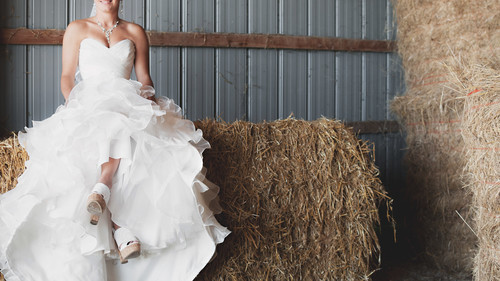Bride in hay barn