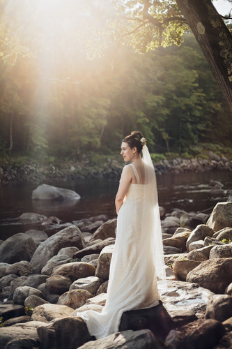 Bride poses at Shelburne Falls