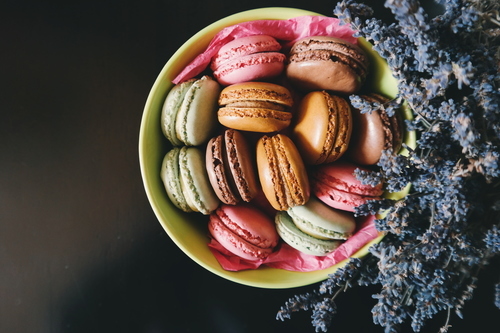 Colorful macaroons in bowl