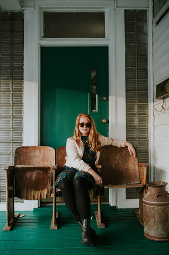 Ginger girl with sunglasses