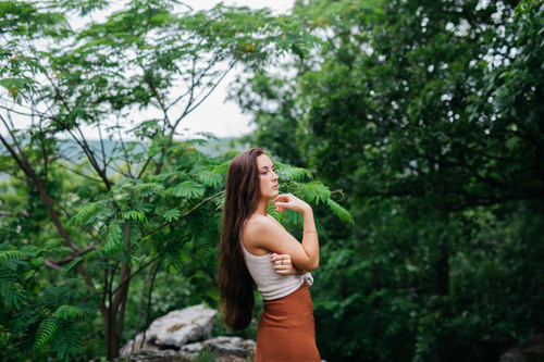 Leaned woman in nature