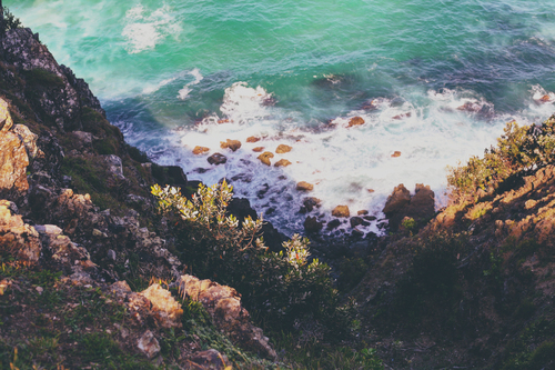 Kliffen en de zee van Byron Bay, Australië