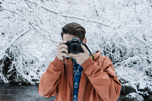 Guy taking photographs