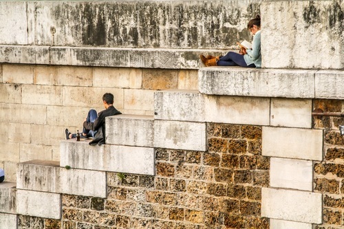 Couple sitting on old stairs