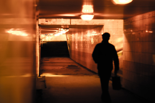 Man in subway passage