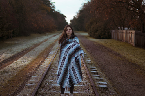 Girl on railroad