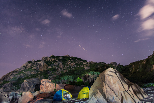 Clear night sky over tents