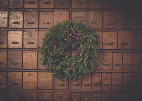 Decorative wreath on wooden drawers