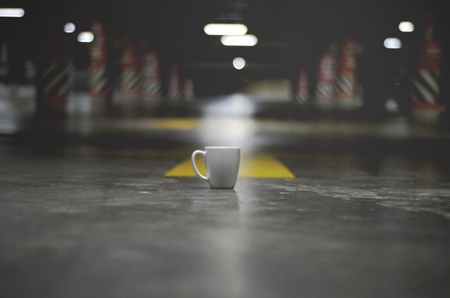 Coffee cup on the floor