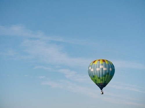 Colorful hot air balloon in flight