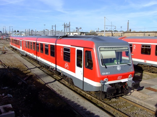 Red electric locomotive on the railway