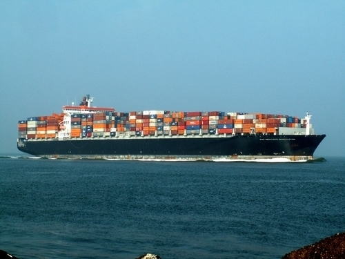 Container cargo ship cruising