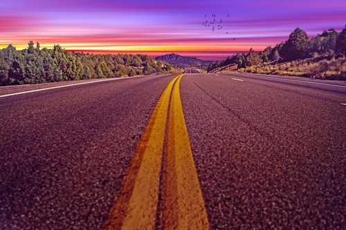 Purple Road Descending Into Sunset