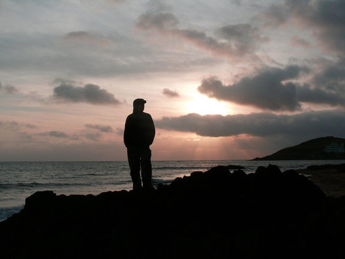 Silhouette of a man in the sunset