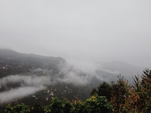 Fog over village in hills