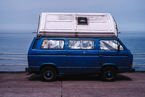 Blue van by the Ocean